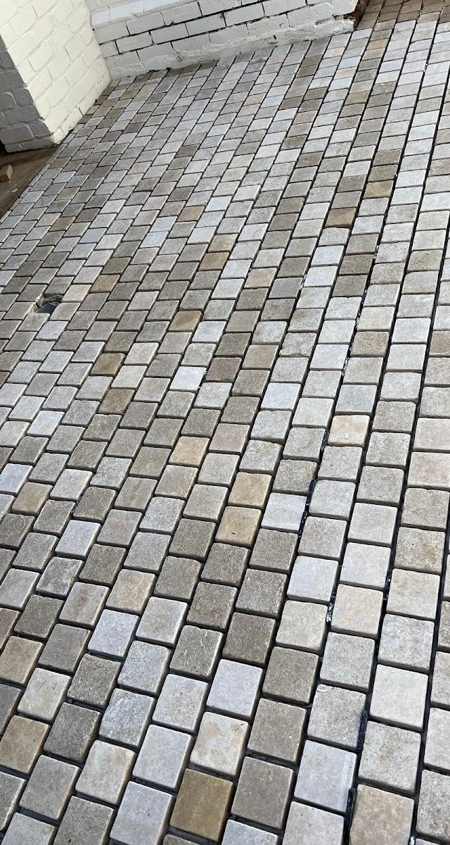 UNIQUE TILING SA