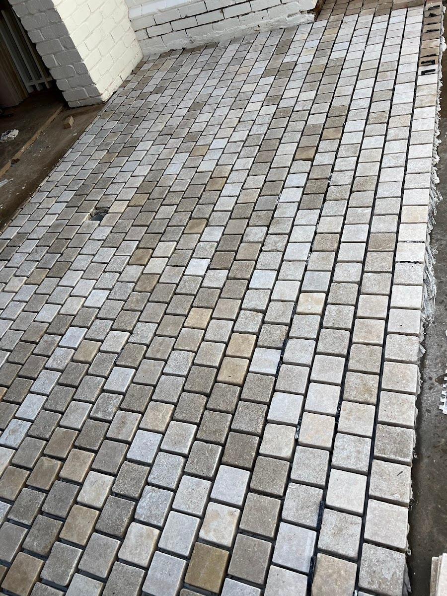 UNIQUE TILING SA
